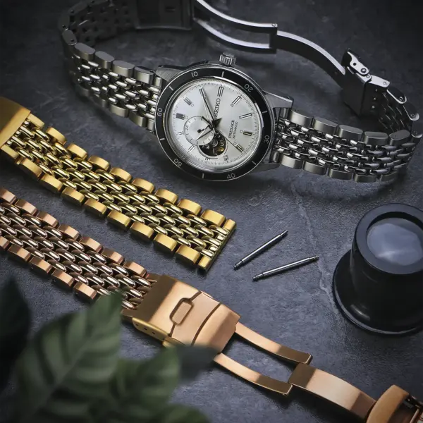 m.bd1 Flatlay StrapsCo Stainless Steel Beads of Rice Watch Band Strap Bracelet